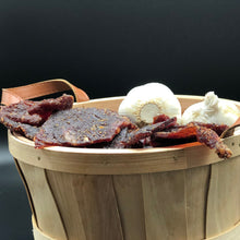Load image into Gallery viewer, A basket of Garlic beef jerky