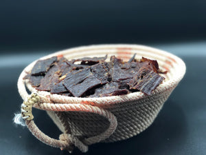 A bowl of beef jerky
